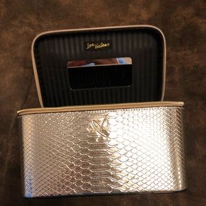 Gold Victoria’s Secret makeup bag
